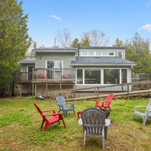 Bright, modern cottage with a large wraparound deck—perfect for relaxing and taking in the lake views.