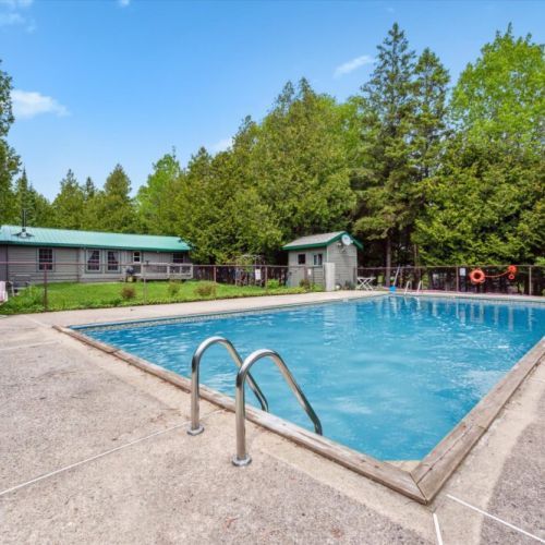 Enjoy exclusive access to a sparkling outdoor pool—ideal for cooling off after summer hikes or lounging under the sun. A perfect spot for fun, relaxation, and family time.
