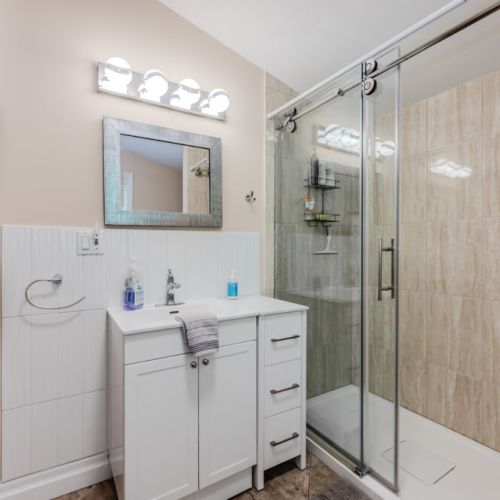Enjoy a hot shower in our beautifully appointed bathroom, complete with all the essentials for a refreshing stay.