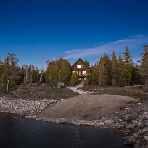 A secluded shoreline setting offering privacy, tranquility, and beautiful lake views.