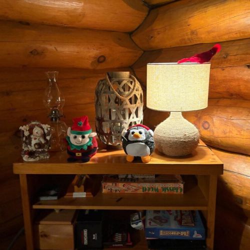 Cabin comforts winter edition, a warm nook with soft light and a sprinkle of seasonal cheer
