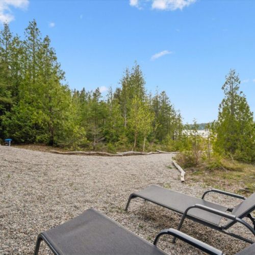 Lounge by the shoreline and enjoy the calm, natural setting surrounding Paradise Pines.