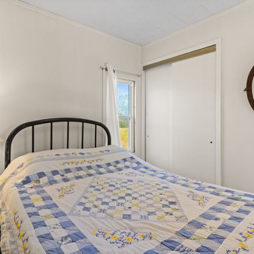 Natural light and peaceful country surroundings make this bedroom a relaxing place to start and end your day.