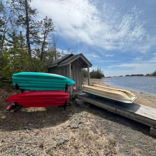 2 kayaks and a paddleboat for guest use