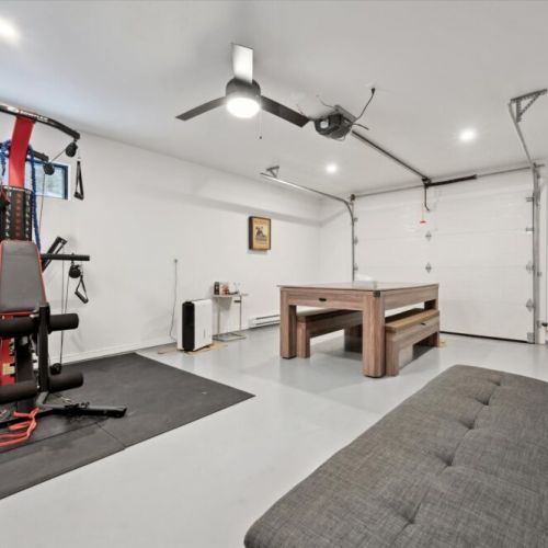A versatile lower-level space combining games, workouts, and relaxation—great for both energetic afternoons and quiet evenings.