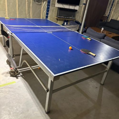 Enjoy friendly competition with a ping-pong table—great for family fun and rainy day entertainment.
