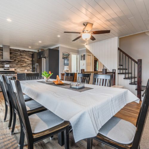 Large dining table—perfect for shared meals, games, and gathering together.