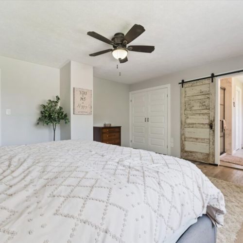 Bedroom 1: Spacious primary bedroom with comfortable bedding and calming décor for restful nights.