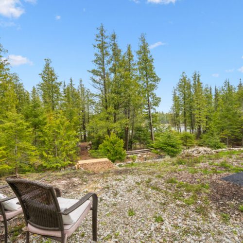 Scenic wooded path leading from the cottage to the shoreline and beach area