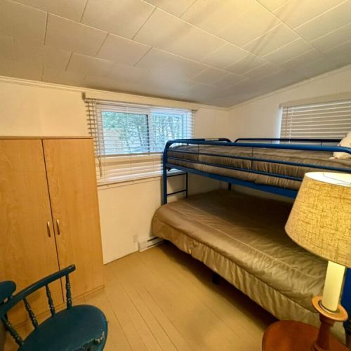 Fun & Functional Bunk Room – This bright and cozy bedroom features a sturdy bunk bed with a double bed on the bottom and a twin on top, making it perfect for kids, friends, or extra guests. Large windows provide natural light, and a wardrobe offers storage space for a comfortable stay.