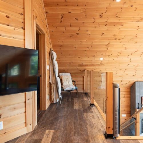 This area is a large space to relax, unwind, and watch movies on those rainy days spent indoors with the family.
