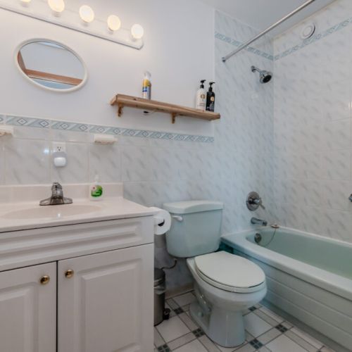 Bright full bathroom with updated fixtures and a clean, fresh feel—everything you need for a comfortable stay.