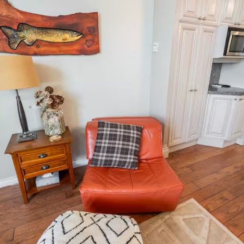 A cozy reading nook with rustic accents, perfect for relaxing with a book or enjoying quiet downtime.