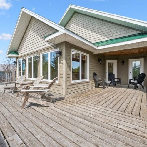 Bright outdoor deck space perfect for dining, lounging, and enjoying fresh air.