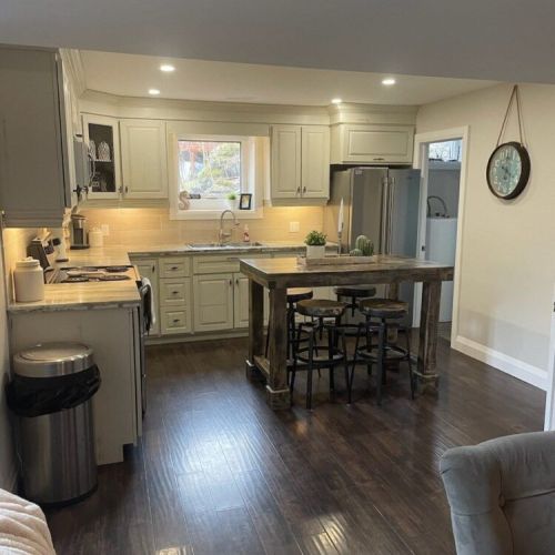 Fully equipped kitchen with large island seating for meals and morning coffee.