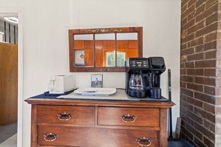 Start your morning at the dedicated coffee station, conveniently set up just steps from the kitchen and dining area.