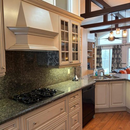 A well-equipped kitchen with gas cooktop and quality finishes. Designed for entertaining, family meals, and comfortable vacation living.