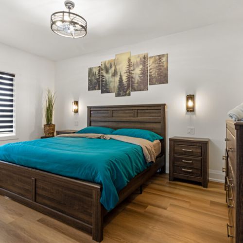 Relax in a comfortable bedroom designed for a peaceful night's sleep.