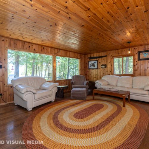 Warm and inviting living space with natural wood throughout—perfect for relaxing after a day outdoors.