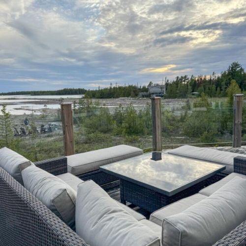Unwind with cozy outdoor seating, panoramic views of Lake Huron, and the soothing sounds of nature. The perfect setting for morning coffee or an evening sunset toast.