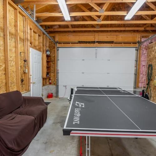 Rainy day? No problem. Head to the games garage for hours of fun — complete with a ping pong table, darts, and seating for friendly competitions and laughter-filled nights.