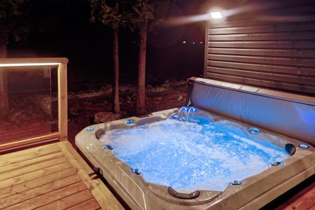 Unwind after dark: End your day exploring Tobermory with a relaxing soak in the hot tub.