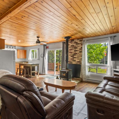 Relax in the cozy open-concept living area after a day of exploring.