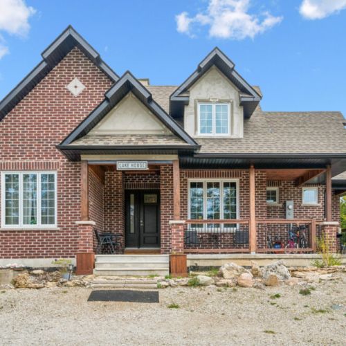 Front entrance of The Brick House, offering a warm and welcoming arrival