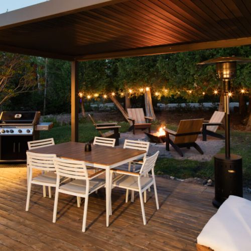 Fire pit, BBQ, Pergola, Dining table, Cozy lighting, perfect place to relax in the evening. Gather around the fire pit for unforgettable evenings, enjoy delicious BBQs on the spacious deck, and dine al fresco under the stars.