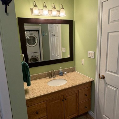 Bright vanity area with lots of counter space and storage for your toiletries.