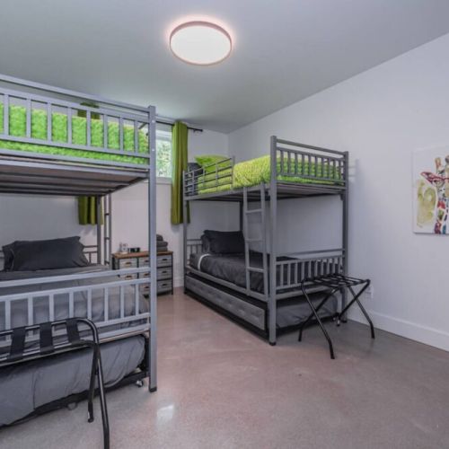 Lime-Green kids room with matching bunk beds.