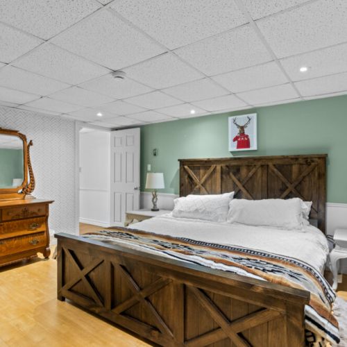 The spacious lower-level bedroom offers extra comfort and privacy.