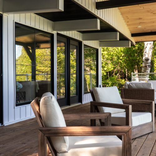Covered deck seating for morning coffee evening drinks and shaded lake watching.