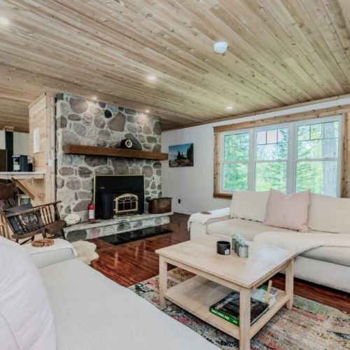 Relax by the fire in the Great room on the plush couches.