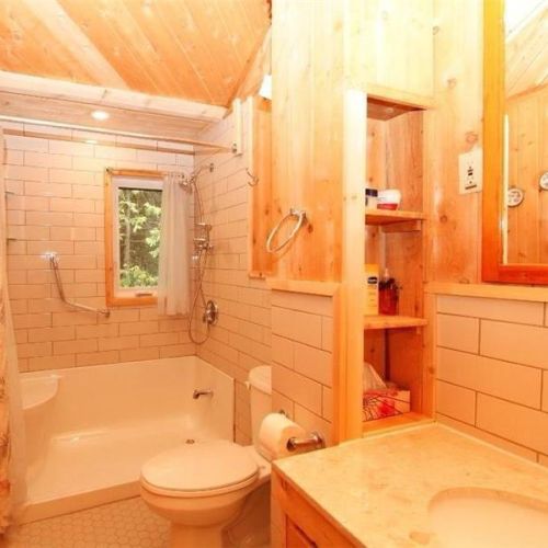 Clean, updated bathroom with a full shower and all essentials.