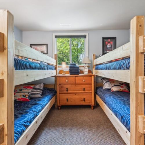 The perfect sleepover space for kids or teens—fun, functional, and full of cozy cottage charm.