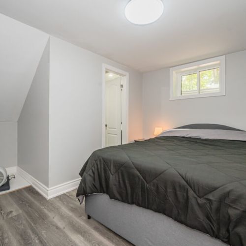 Lower level master bedroom with ensuite.