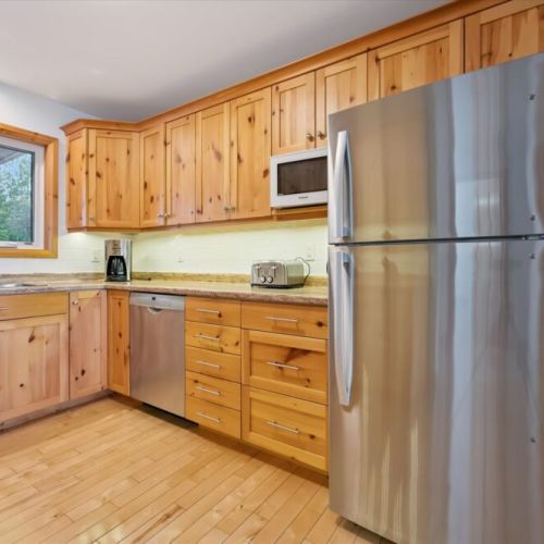 The fully equipped kitchen makes preparing cottage meals simple and convenient.