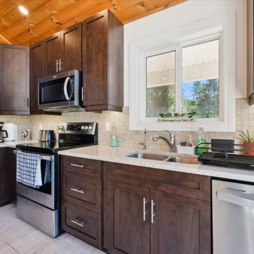 Thoughtfully designed with contemporary finishes, the kitchen offers everything needed for home-cooked meals during your stay.