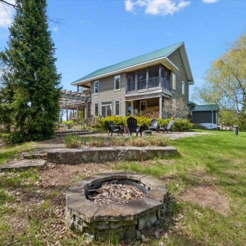 Backyard fire pit area perfect for relaxing evenings and outdoor gatherings.