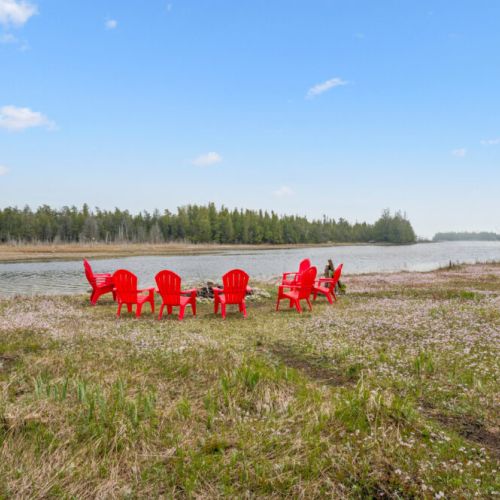 Waterfront seating area with beautiful views across Dorcas Bay, ideal for sunsets and quiet moments
