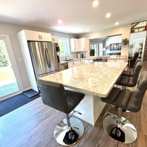 With comfortable seating and room to spare, this kitchen island invites conversation as much as cooking.