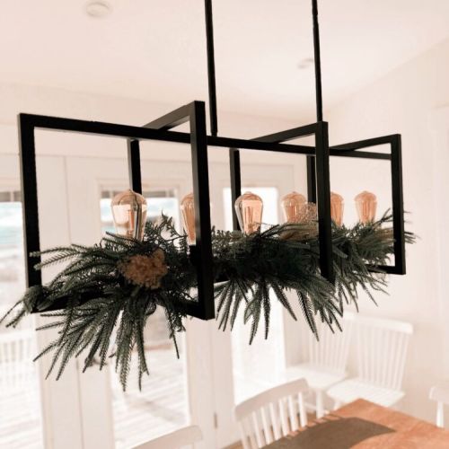 Winter greens and warm light—elegant touches that make Driftwood feel festive and inviting.