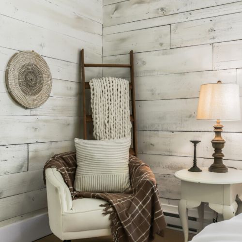 Sweet reading nook with cozy textures perfect for morning coffee or a good book.