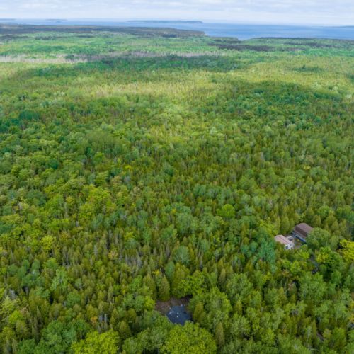 Bearfoot Lodge rests fully secluded on a private lot in the Cameron Lake - National Park Community.