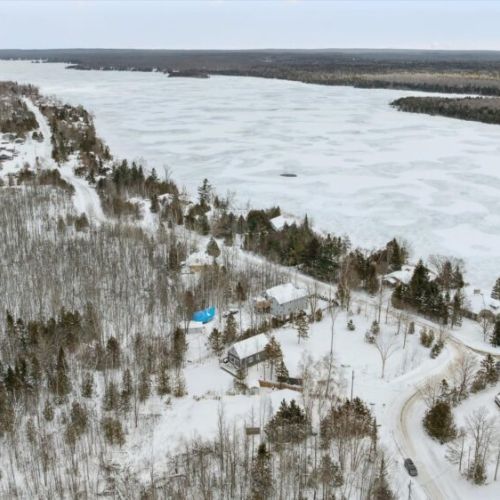 Stunning winter view of Miller Lake and surrounding shoreline, just minutes from the cottage.