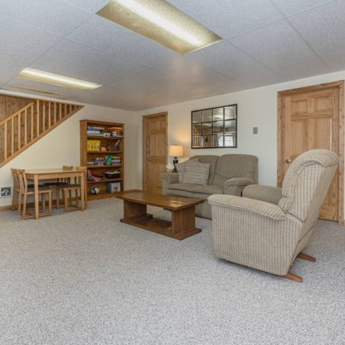 Lower level lounge with games area.