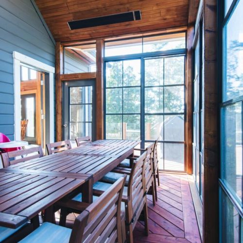 Enjoy meals in the Muskoka room—sunlit, spacious, and protected from the elements.