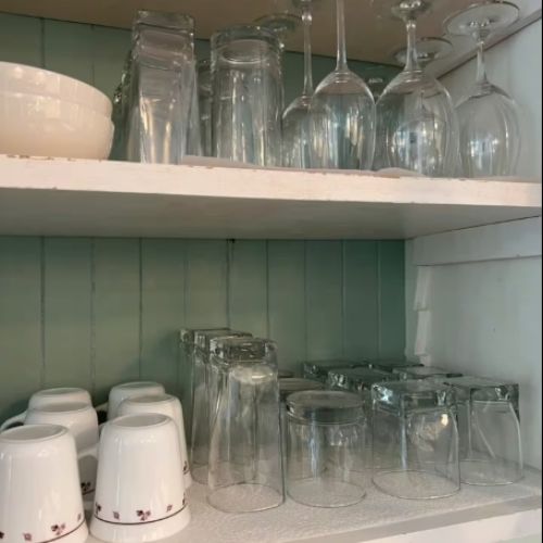 From morning coffee to evening wine, every glass and cup you need is right here — clean, organized, and ready for your stay.