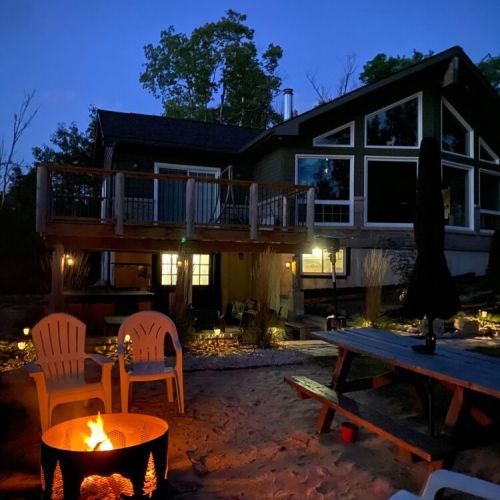 Enjoy the warmth of a fire pit with comfortable chairs provided for your stay. Firewood is available for an additional charge and can be delivered right to you during your visit during spring/summer/fall months.